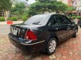 Ford Laser   1.8 Ghia  2005 - Cần bán Ford Laser 1.8 Ghia 2005, màu đen