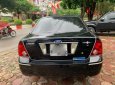 Ford Laser   1.8 Ghia  2005 - Cần bán Ford Laser 1.8 Ghia 2005, màu đen