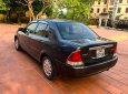 Ford Laser   Deluxe 1.6 MT 2002 - Xe Ford Laser Deluxe 1.6 MT năm 2002, màu xám