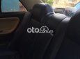 Mazda 323    1996 - Bán Mazda 323 1996, màu trắng, nhập khẩu, giá 48tr