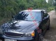 Daewoo Magnus   2.5 AT  2004 - Cần bán gấp Daewoo Magnus 2.5 AT 2004, màu đen còn mới  