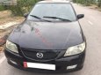 Mazda 323   Standard 1.6 MT 2001 - Cần bán lại xe Mazda 323 Standard 1.6 MT đời 2001, màu đen, giá chỉ 80 triệu