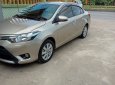 Toyota Vios E 2014 - Bán Toyota Vios E sản xuất 2014, màu vàng cát, giá chỉ 295 triệu