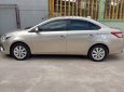 Toyota Vios E 2014 - Bán Toyota Vios E sản xuất 2014, màu vàng cát, giá chỉ 295 triệu