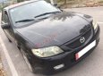 Mazda 323   Standard 1.6 MT 2001 - Cần bán lại xe Mazda 323 Standard 1.6 MT đời 2001, màu đen, giá chỉ 80 triệu