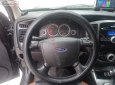 Ford Escape   AT  2009 - Cần bán xe Ford Escape AT năm sản xuất 2009, màu đen còn mới