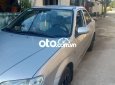 Mazda 323 2001 - Bán Mazda 323 2001, màu bạc, 105 triệu