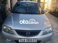 Mazda 323 2001 - Bán Mazda 323 2001, màu bạc, 105 triệu
