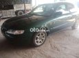 Mazda 626 2002 - Cần bán gấp Mazda 626 đời 2002, màu xanh lục, nhập khẩu