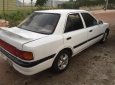 Mazda 323   1.6 MT   1995 - Cần bán gấp Mazda 323 1.6 MT 1995, màu trắng, giá tốt