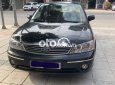 Ford Laser  AT 2004 - Bán Ford Laser AT 2004, màu đen