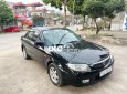 Mazda 323 2004 - Bán ô tô Mazda 323 đời 2004, màu đen, nhập khẩu nguyên chiếc, 158 triệu