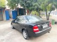 Mazda 323 2004 - Bán ô tô Mazda 323 đời 2004, màu đen, nhập khẩu nguyên chiếc, 158 triệu