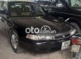 Mazda 626 1996 - Cần bán Mazda 626 năm 1996, màu đen, nhập khẩu nguyên chiếc, 62tr