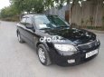 Mazda 323 2004 - Cần bán lại xe Mazda 323 sản xuất năm 2004, màu đen, giá 150tr