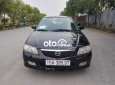 Mazda 323 2004 - Cần bán lại xe Mazda 323 sản xuất năm 2004, màu đen, giá 150tr