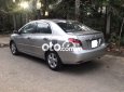 Toyota Vios E  2009 - Cần bán xe Toyota Vios E sản xuất năm 2009 màu ghi vàng, 215 triệu