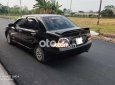 Mitsubishi Lancer 2003 - Cần bán xe Mitsubishi Lancer sản xuất năm 2003, màu đen còn mới giá cạnh tranh