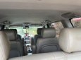 Kia Carnival   GS 2.5 AT  2009 - Cần bán Kia Carnival GS 2.5 AT năm sản xuất 2009, màu đen, 215 triệu