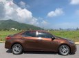 Toyota Corolla 1.8 G 2015 - Bán Toyota Corolla 1.8 G năm 2015, màu nâu, xe nhập