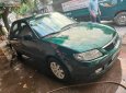 Mazda 323 2002 - Cần bán xe Mazda 323 đời 2002, màu xanh lam