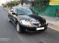 Mitsubishi Lancer 2003 - Cần bán xe Mitsubishi Lancer sản xuất năm 2003, màu đen còn mới giá cạnh tranh