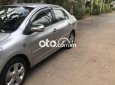 Toyota Vios E  2009 - Cần bán xe Toyota Vios E sản xuất năm 2009 màu ghi vàng, 215 triệu