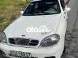 Daewoo Lanos 2001 - Cần bán gấp Daewoo Lanos sản xuất năm 2001, màu trắng, nhập khẩu nguyên chiếc