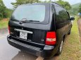 Kia Carnival   GS 2.5 AT  2009 - Cần bán Kia Carnival GS 2.5 AT năm sản xuất 2009, màu đen, 215 triệu