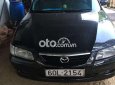 Mazda 626    2001 - Xe Mazda 626 2001, màu đen, xe nhập còn mới, giá 95tr