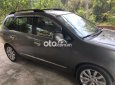 Kia Carens SX 2.0AT 2010 - Bán Kia Carens SX 2.0AT sản xuất năm 2010, màu xám xe gia đình