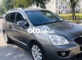 Kia Carens MT 2013 - Cần bán Kia Carens MT đời 2013, màu xám còn mới, 262 triệu