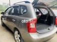 Kia Carens 2009 - Cần bán Kia Carens 2.0 MT đời 2009, màu xám còn mới