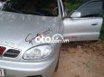 Daewoo Lanos MT 2003 - Cần bán gấp Daewoo Lanos MT sản xuất 2003, màu bạc, nhập khẩu