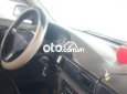 Mazda 323    1992 - Cần bán gấp Mazda 323 2.0MT năm sản xuất 1992, màu đỏ, xe nhập