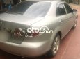 Mazda 6  MT 2004 - Cần bán gấp Mazda 6 MT 2004, màu vàng cát