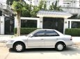 Toyota Corolla GLi 2000 - Cần bán gấp Toyota Corolla GLi 2000, màu bạc 