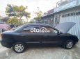 Kia Spectra LS 2005 - Bán xe Kia Spectra LS 2005, màu đen xe gia đình, 98tr