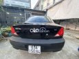 Kia Spectra LS 2005 - Bán xe Kia Spectra LS 2005, màu đen xe gia đình, 98tr