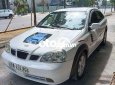 Daewoo Lacetti MT 2004 - Bán Daewoo Lacetti MT 2004, màu trắng, xe nhập