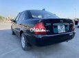 Mazda 323 2004 - Bán xe Mazda 323 đời 2004, màu đen xe gia đình