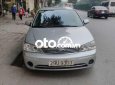 Ford Laser 2004 - Cần bán lại xe Ford Laser 1.6MT đời 2004, màu bạc, giá 130tr