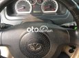 Daewoo Gentra MT 2009 - Bán ô tô Daewoo Gentra MT đời 2009, màu đen, giá 135tr
