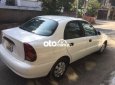 Daewoo Lanos 2004 - Cần bán xe Daewoo Lanos đời 2004, màu trắng