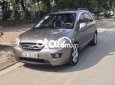 Kia Carens 2009 - Cần bán Kia Carens 2.0 MT đời 2009, màu xám còn mới