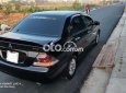 Mitsubishi Lancer 2004 - Cần bán lại xe Mitsubishi Lancer đời 2004, màu đen còn mới