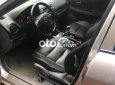 Mazda 6  MT 2004 - Cần bán gấp Mazda 6 MT 2004, màu vàng cát