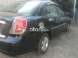 Daewoo Lacetti MT 2005 - Cần bán xe Daewoo Lacetti MT sản xuất 2005, màu đen