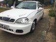 Daewoo Lanos MT 2000 - Cần bán lại xe Daewoo Lanos MT đời 2000, màu trắng, xe nhập 