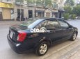 Daewoo Lacetti   EX 2010 - Cần bán Daewoo Lacetti EX sản xuất năm 2010, màu đen số sàn, giá 150tr